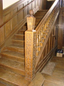 Stairway with carved newel post